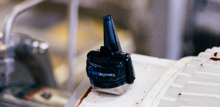 Vibration monitor on a motor.