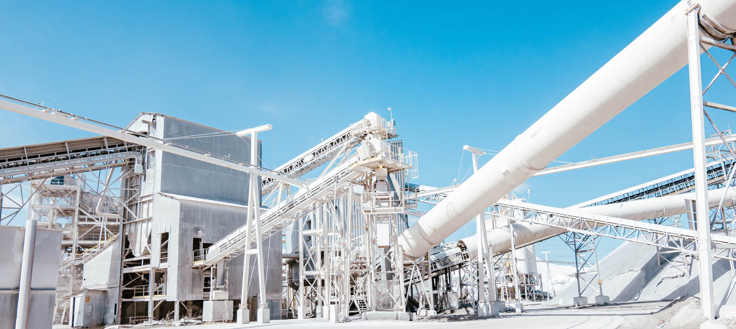 Mining operation showing augers, slides, and conveyors.