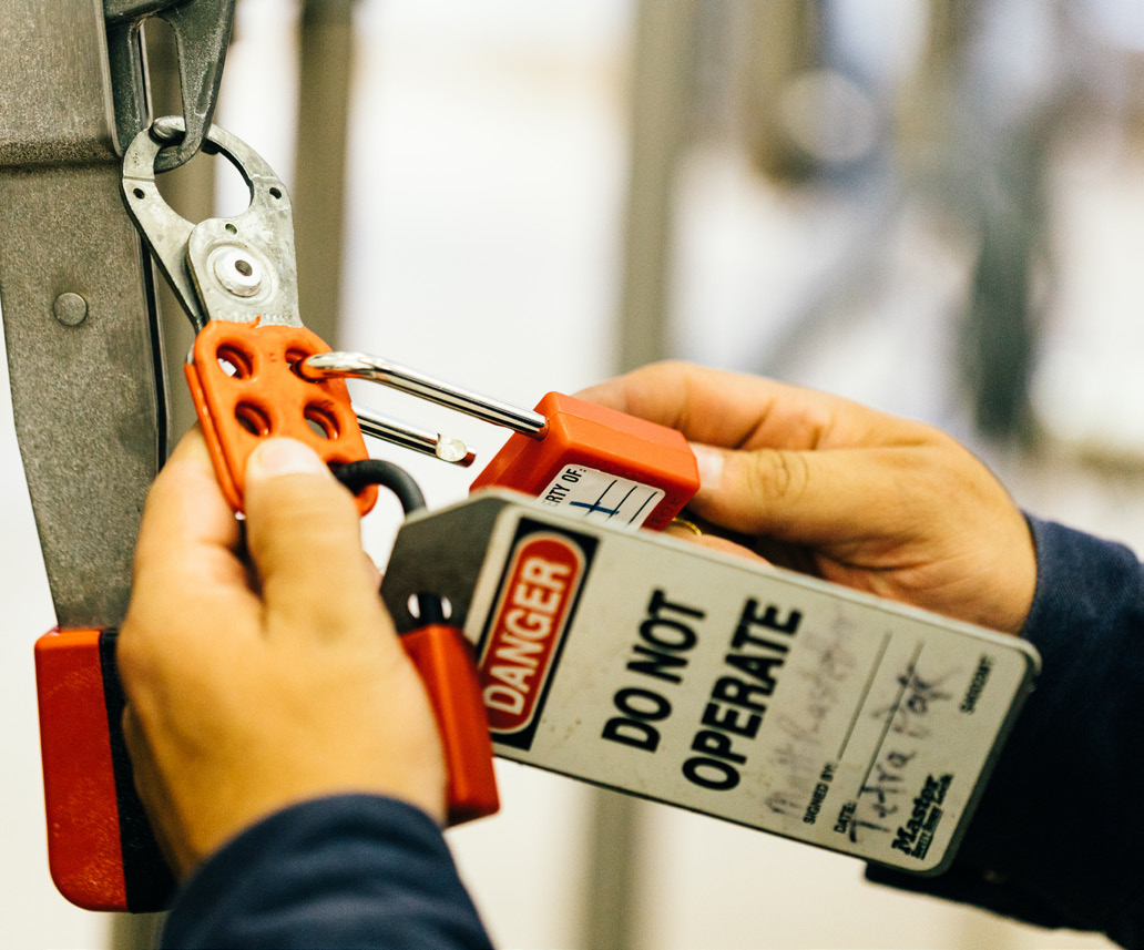 Lockout Tagout log going onto industrial machinery.