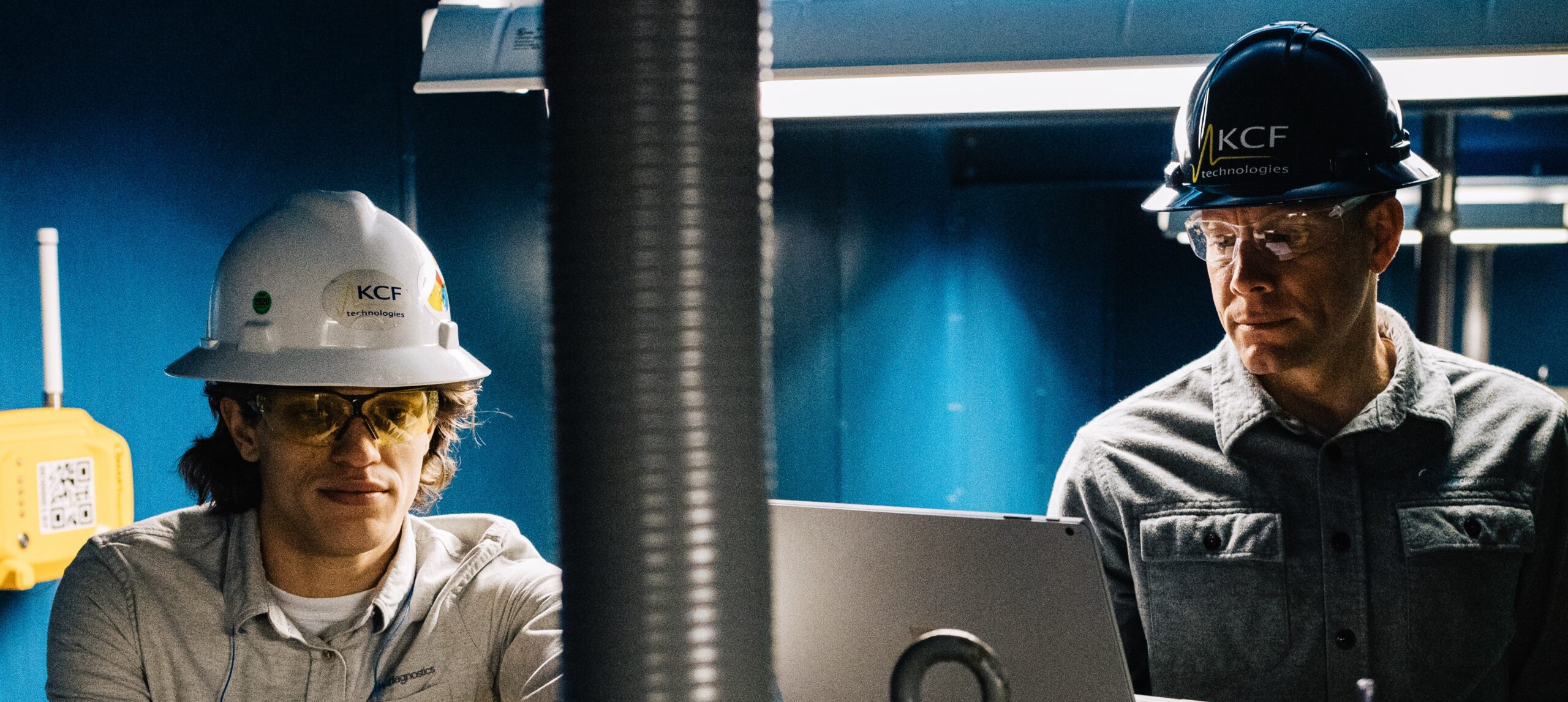 KCF technologies engineers work to install SMARTdiagnostics at an industrial location.