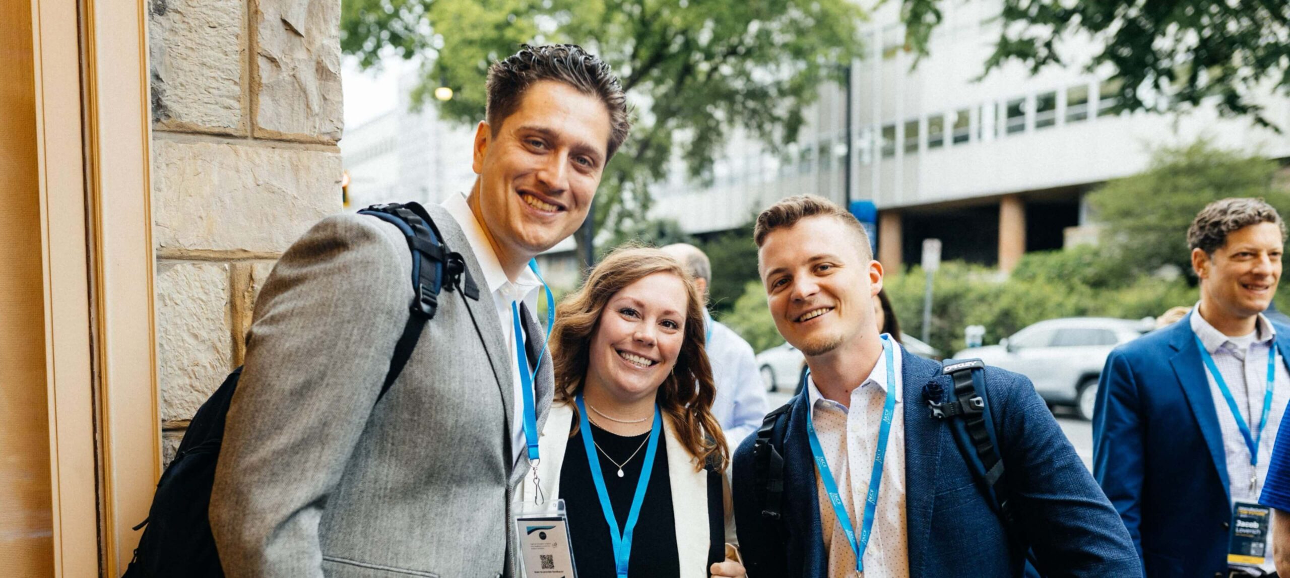 KCF Employees smile while attending a seminar.
