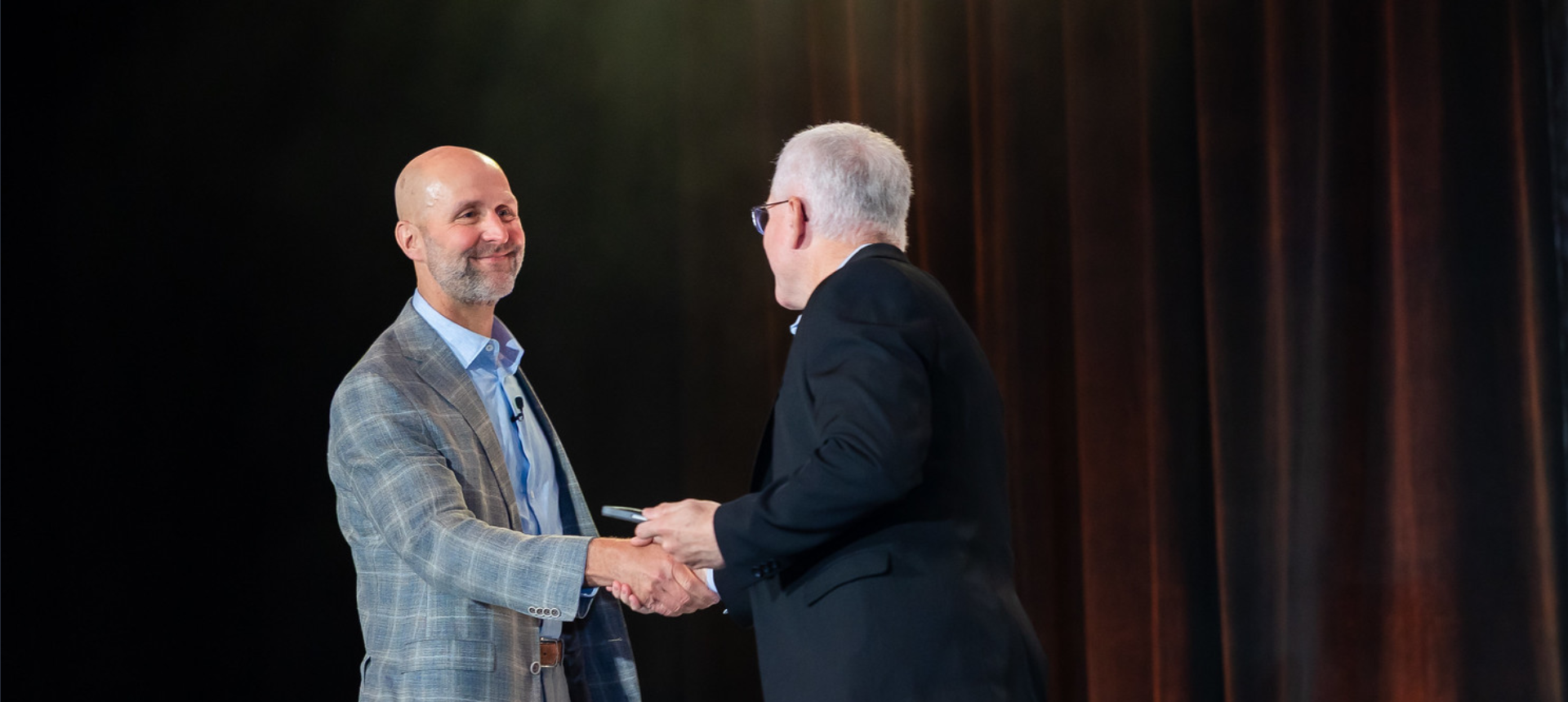 Dr. Jeremy Frank, Co-Founder and CEO of KCF Technologies shakes hands with the Event or Webinar host.