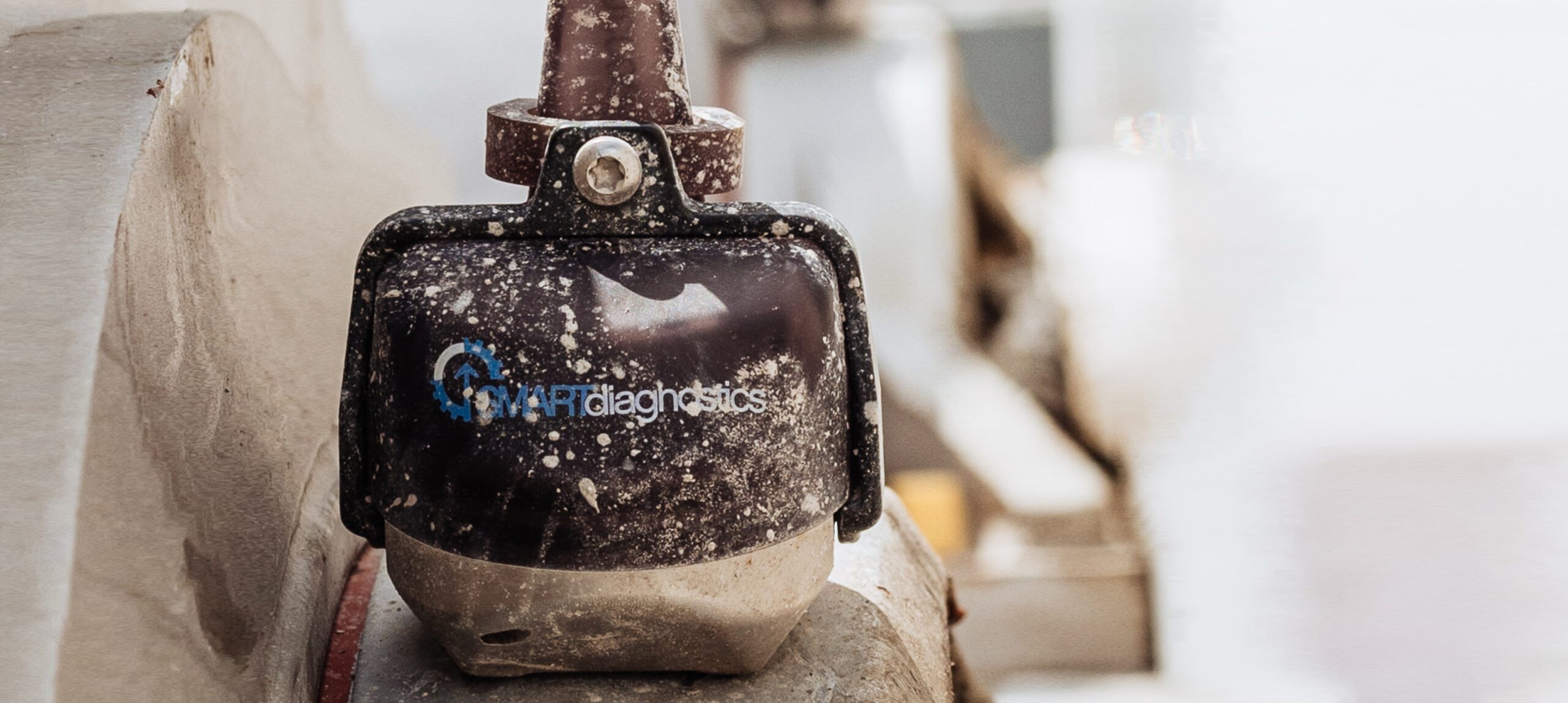 Rugged and reliable, the SMARTdiagnostics monitor shown in use, with mud and debris in the image.