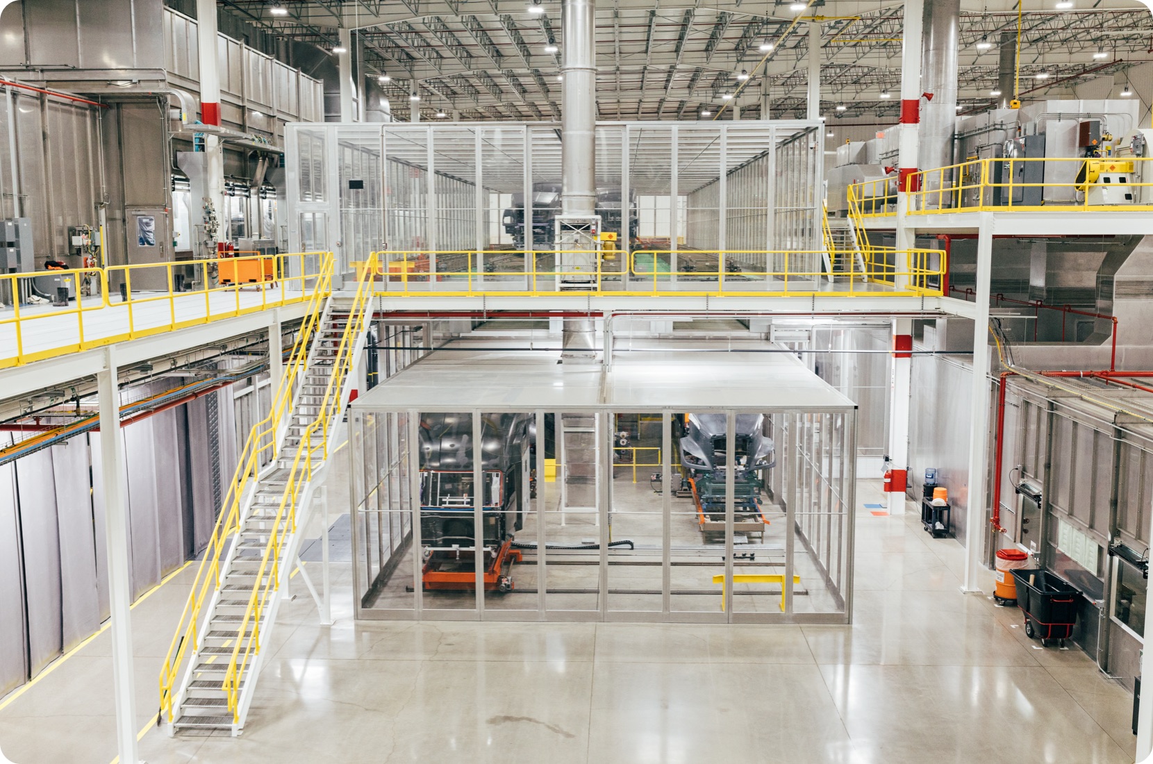 Production floor with clean-room visible for industrial manufacturing.