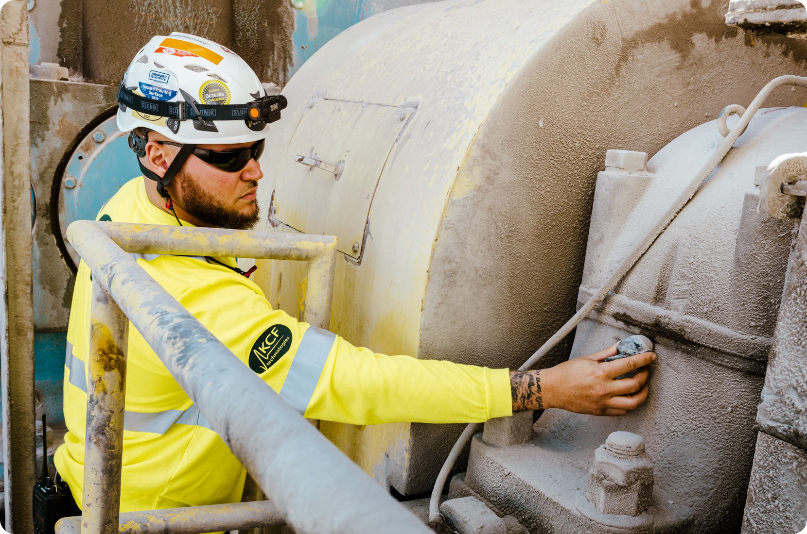 KCF Technlogies inspects a predictive maintenance monitor for vibration in a remote location.