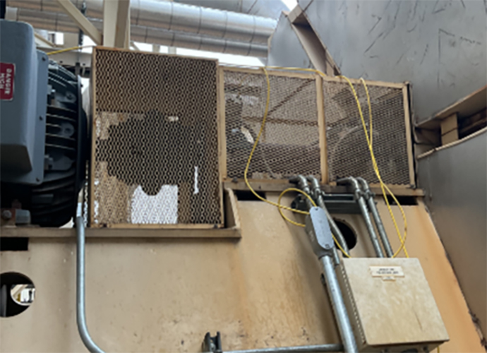 Regenerative thermal oxidizers (RTO), brown metal housing and gray motor.