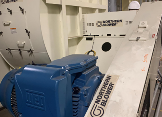 Supply fan and blue motor for an automotive paint booth.
