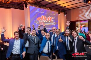 Group celebration at a conference event.