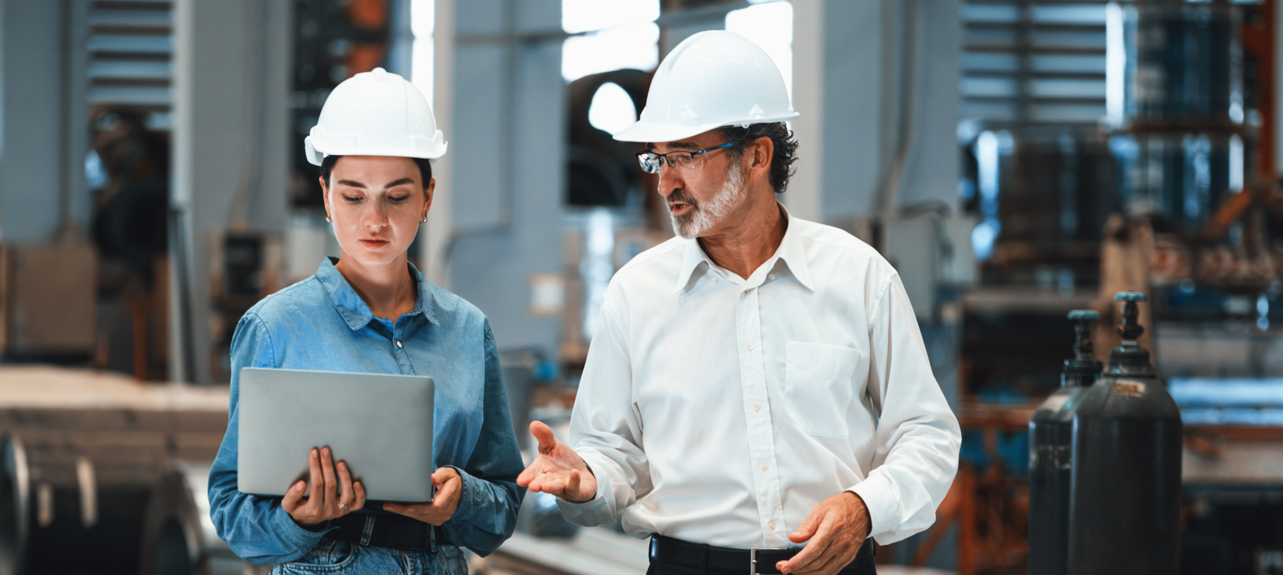 corporate leader executive touring manufacturing plant