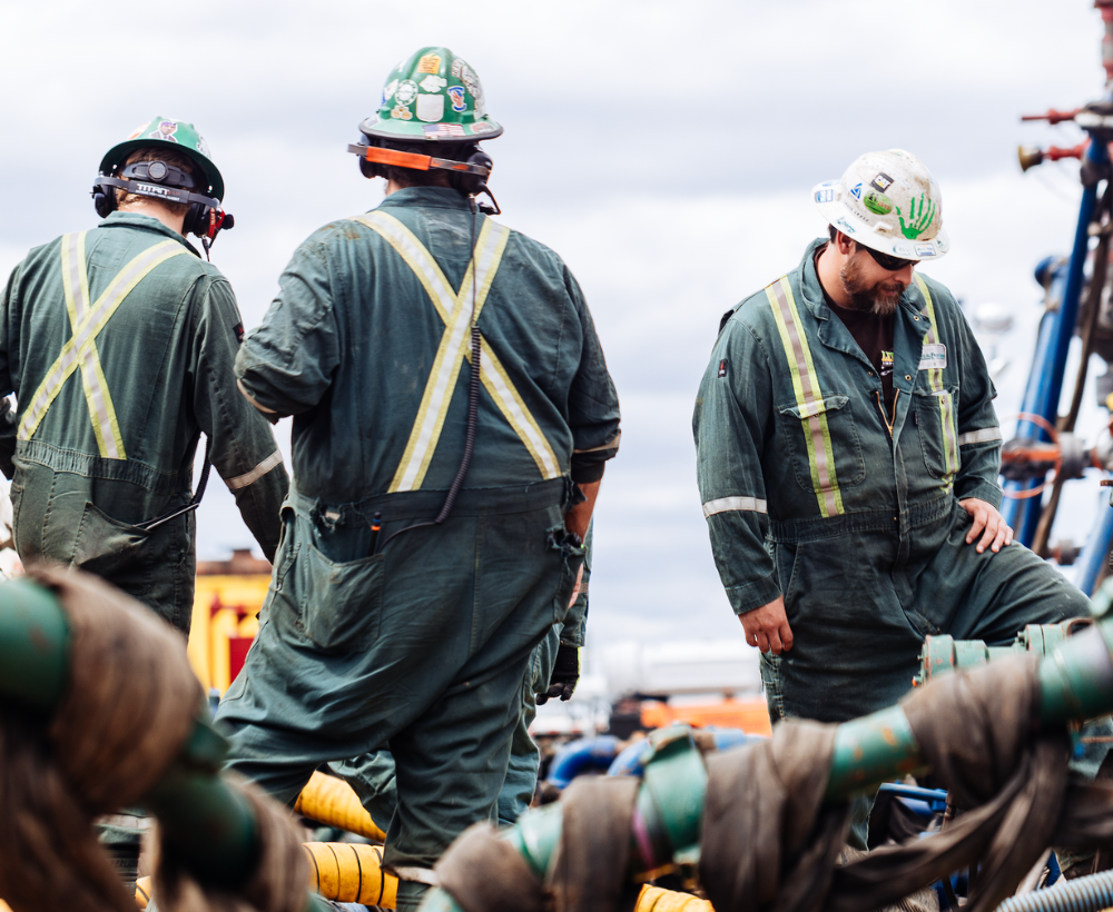 maintenance professionals working on an oil rig